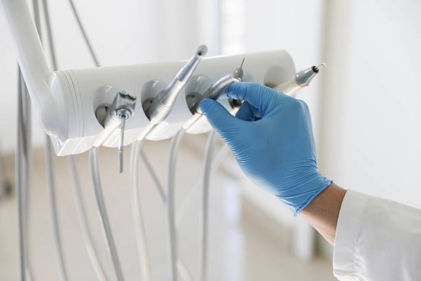 Professional Wisdom Tooth Removal technician working in Sully Square, VA